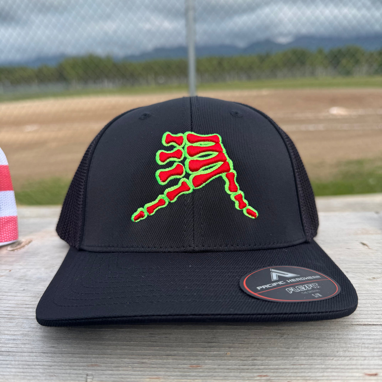 AkS Bones Flatbill Trucker Hat in Black with Red and LimeDrop