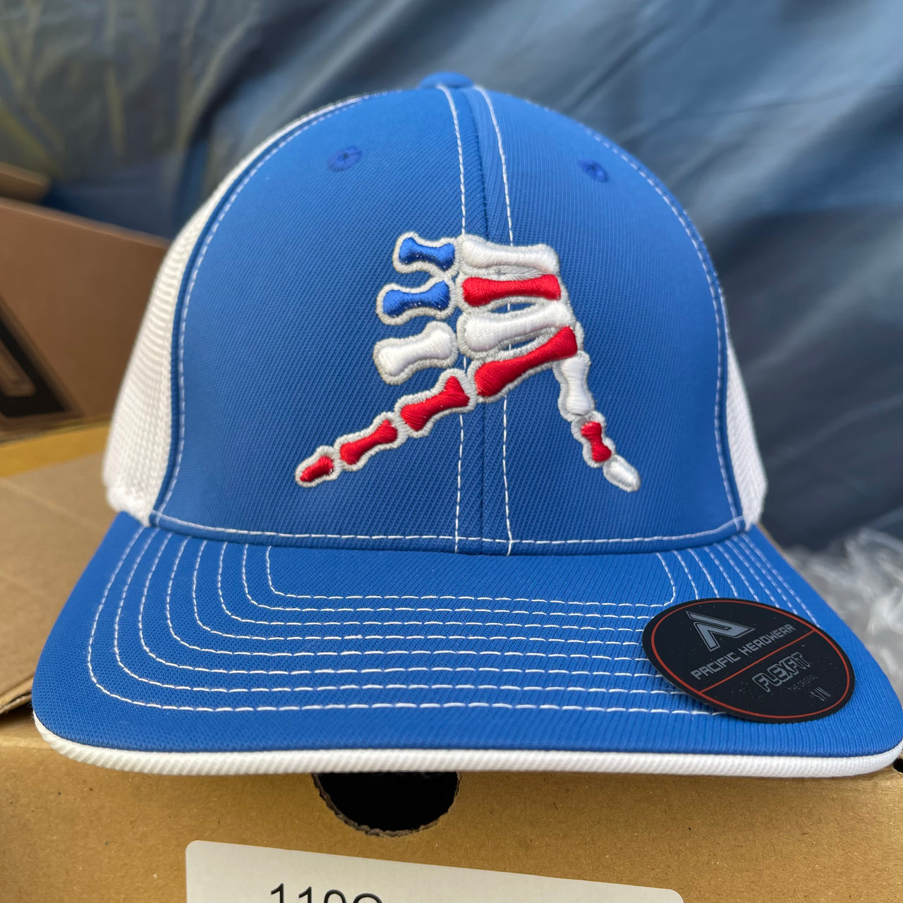 AkS Bones Stripes Trucker hat in Royal and White