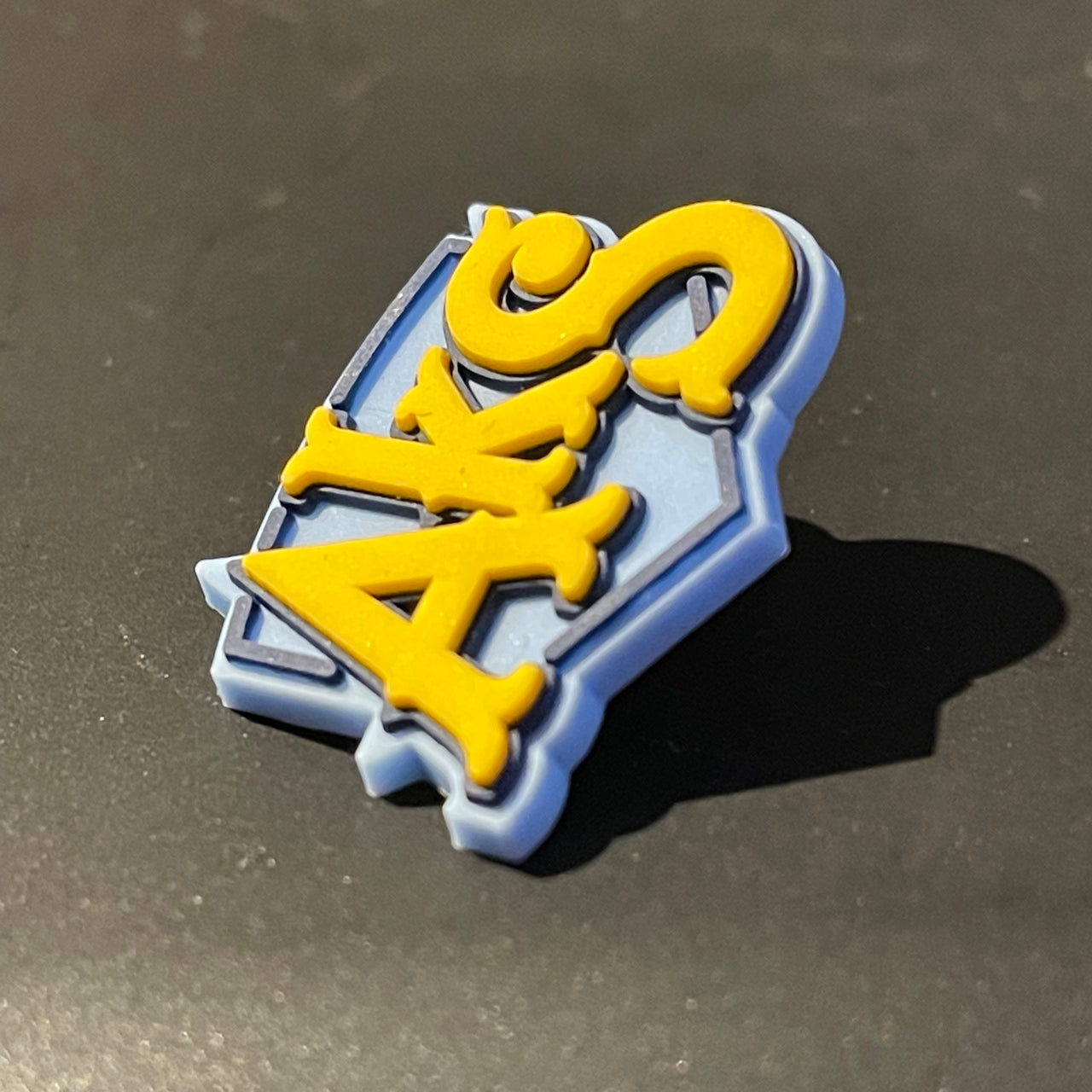 AkS Shield Croc Charm