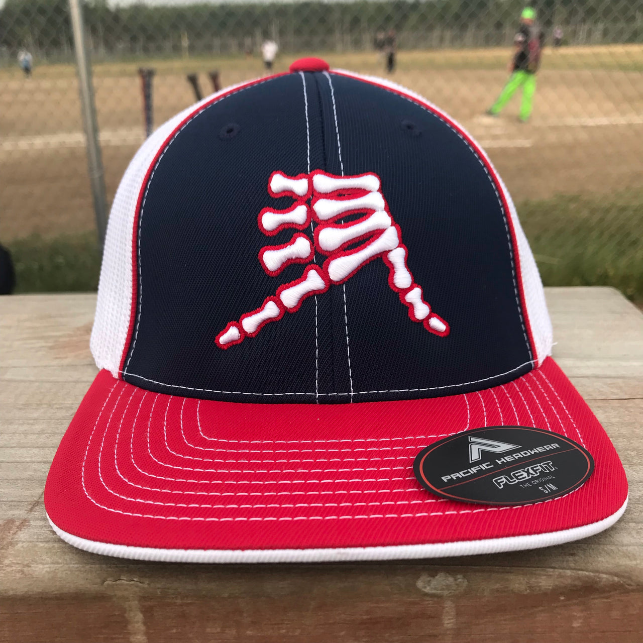 AkS Bones Trucker Hat in Navy, Red & White