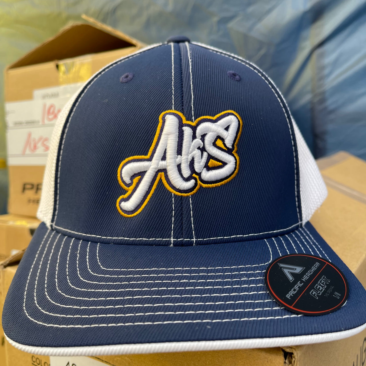 AkS Graffiti Trucker Hat in Navy and White
